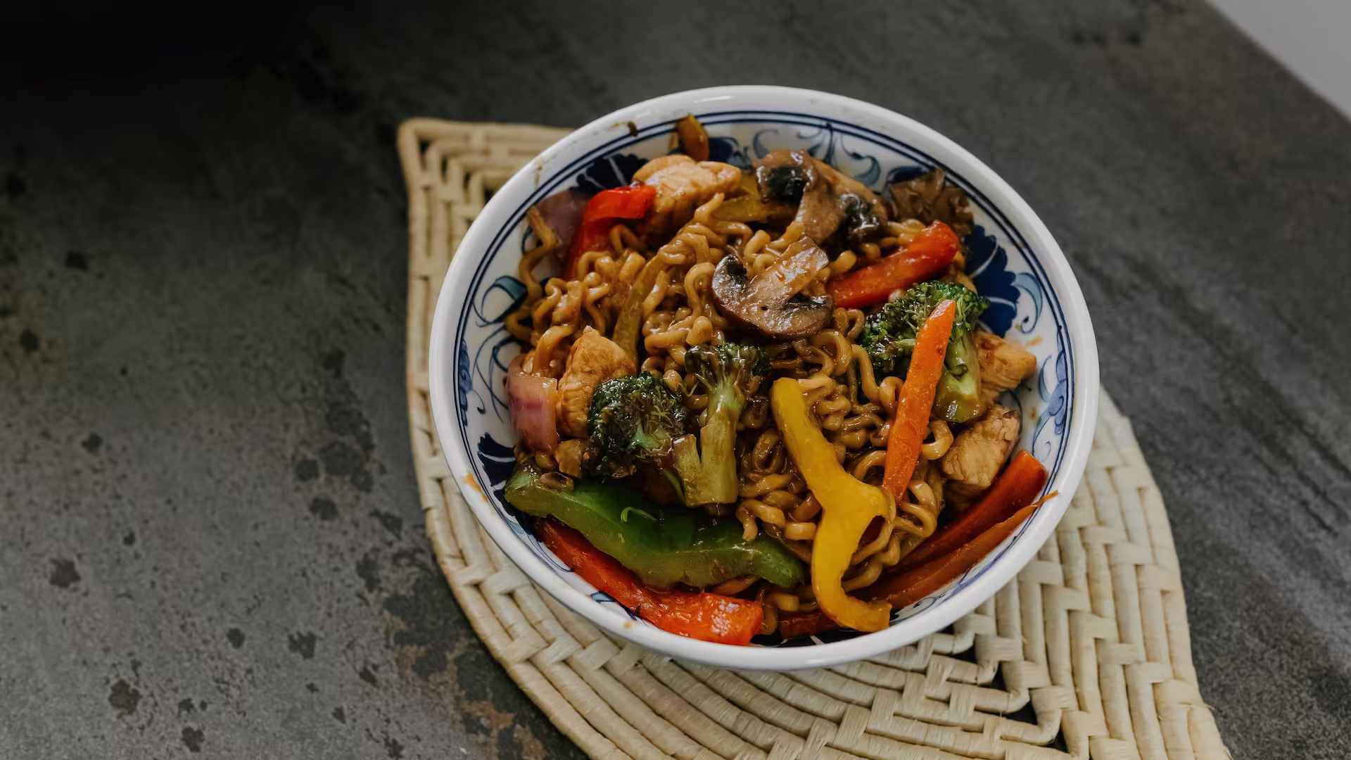 Delicious spicy chicken chili in a bowl with toppings